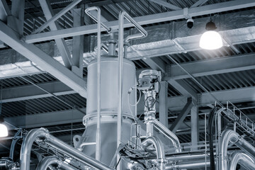 Food production machine with stainless steel pipes, cooling radiator as separator and tanks, valves and measuring instruments