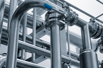 Food production machine with stainless steel pipes, cooling radiator as separator and tanks, valves and measuring instruments