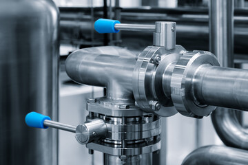 Food production machine with stainless steel pipes, cooling radiator as separator and tanks, valves and measuring instruments