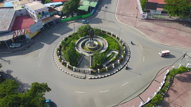 The landmark roundabout honoring Francisco Xavier do Amaral, the first president of Timor-Leste. An aerial view of the monument and traffic circle in the capital city of Dili.