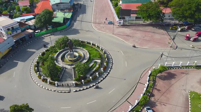 The landmark roundabout honoring Francisco Xavier do Amaral, the first president of Timor-Leste. An aerial view of the monument and traffic circle in the capital city of Dili.