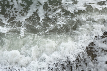 beautiful wave on sea at storm art cloudy day. close up