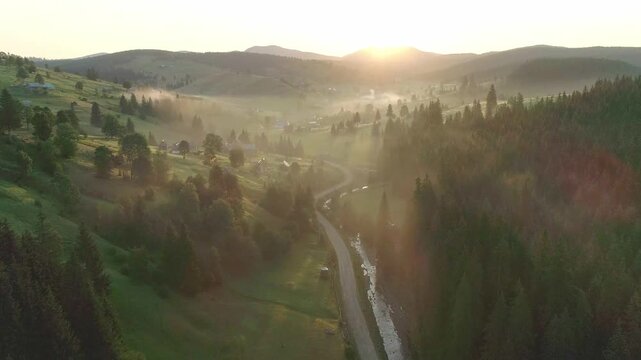 Early morning with fresh fog in hill green mountain, Fresh morning fog blankets green hills and mountains in soft dawn light. creates serene mystical landscape ideal for nature and tranquility themes
