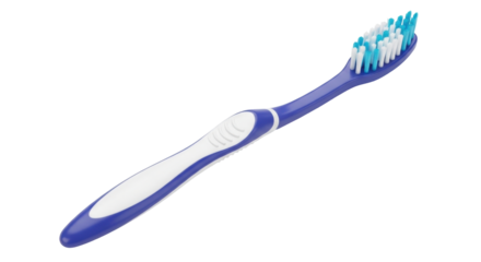 Isolated blue toothbrush with white and turquoise bristles for oral hygiene, close-up shot