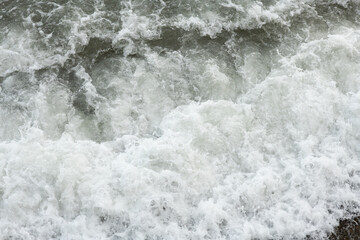beautiful wave on sea at storm at cloudy day. close up