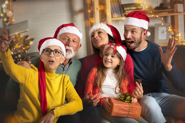 Family members make selfie in living room gather celebrate Christmas