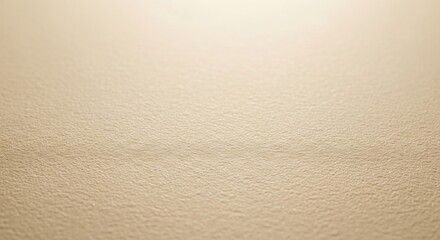Softly Lit Textured Surface with Subtle Gradient and Shallow Depth of Field
