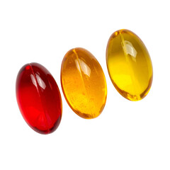 Three colorful, translucent, oval capsules are displayed against a stark black background