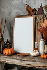 Halloween mockup with blank frame surrounded by pumpkins and autumn leaves for seasonal designs. Vertical banner. Copy space. Template for a cosmetics shop, beauty salon, pharmacy, drugstore