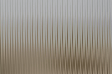 Obraz premium Elegant silver background with vertical lines creating a modern aesthetic look