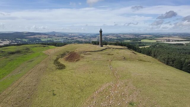 Waterloo Monument over Scottish fields and farms from a drone, Jedburgh, Scotland, UK