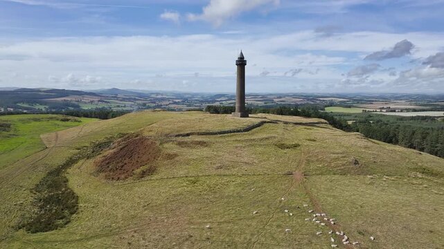Waterloo Monument over Scottish fields and farms from a drone, Jedburgh, Scotland, UK