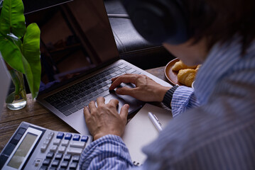 businessman working on laptop computer