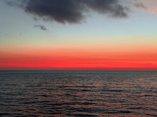 tender purple and orange gradient sky at the sea, sunset sea horizon, natural colors