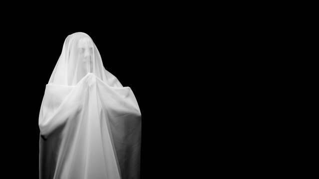 Ghost costume figure in dark studio - Powered by Adobe