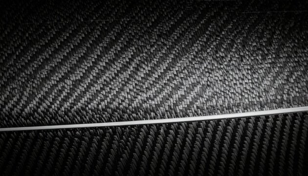 Close-up of layered carbon fiber sheets with diagonal weaves and fine reflections, highlighting the precision and modern appeal of composite materials.