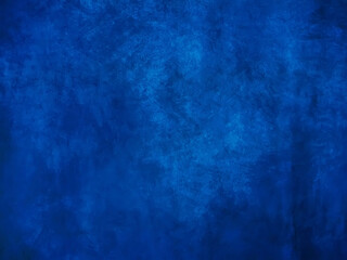 Blue painted canvas background for design. Rich saturated color.