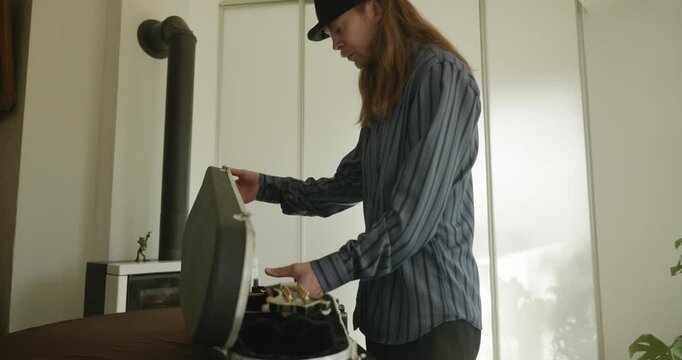 Male Musician Diligently Take Care of Instrument. Wipe Dust from Mandolin 4K 10-bit