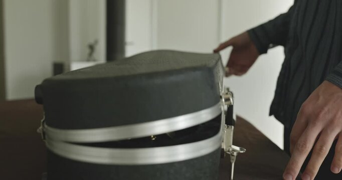 Male Musician Diligently Take Care of Instrument. Wipe Dust from Mandolin 4K 10-bit