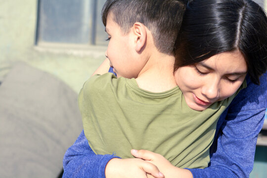 Happy loving little latin siblings.
