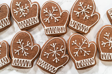 Beautifully Decorated Mitten Cookies with Royal Icing Designs