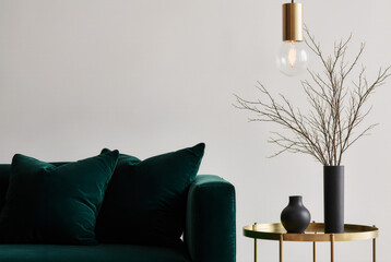 Winter Glam Living Room with Brass and Emerald Accents