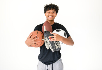 black teens in sportswear playing multi sport basketball soccer football game on studio white background © Louis-Paul Photo