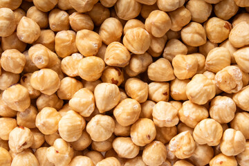 roasted hazelnuts closeup, shelled nuts background, healthy snack