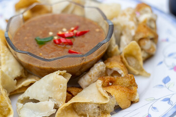 A Close-Up Shot of a Delicious Indonesian Food Dish Batagor and Peanut Sauce