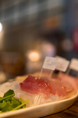 Thai tasty sashimi. Fresh and clean fish arranged on a dish