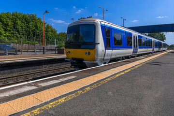 Naklejka premium passenger urban commuter rural railway station england uk