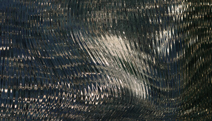 Dark textured fabric with diagonal light reflection and subtle pattern