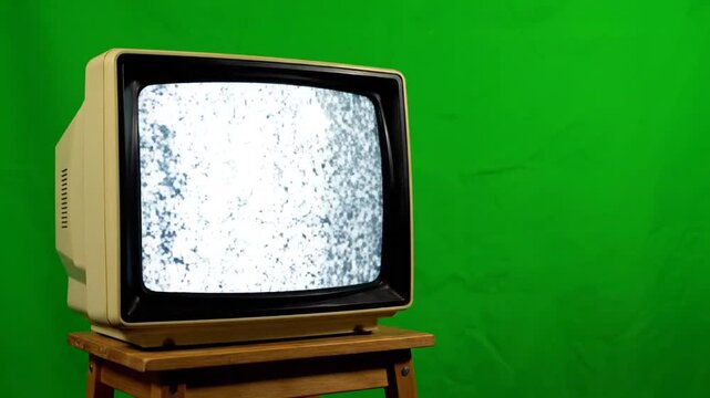 Vintage Television Static on green background.