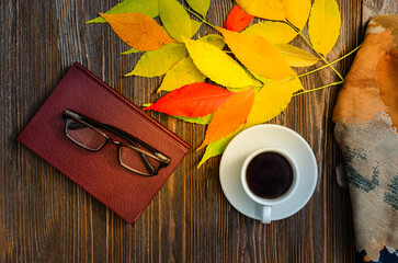 Cozy Autumn Reading Break with Coffee and Book on Wood