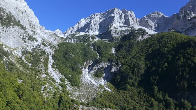 View from top of the Albanian peak down to the valbona valley during autumn hiking season