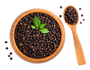 Black peppercorns in a wooden bowl
