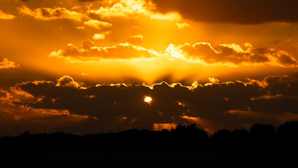 Majestic sunset with cloudy sky