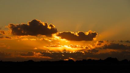 Majestic sunset with cloudy sky