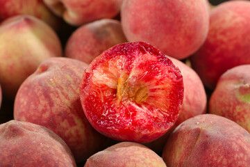 Fresh Hubei Peaches Cut in Half Showing Juicy Red Flesh - Ripe Stone Fruit Collection