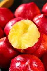 Fresh Red Nectarines with Yellow Flesh Cut in Half Close-Up