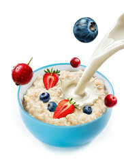 oatmeal and berries in blue ceramic bowl isolated white background. a mockup for package design