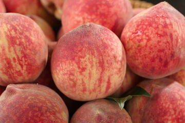 Fresh Ripe Peaches with Red Striped Skin and Fuzzy Texture