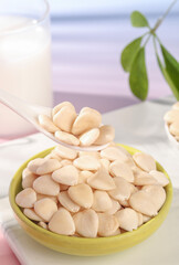 Peeled Sliced Almonds in Bowl with Milk - Healthy Snack and Baking Ingredient