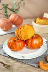Fresh Golden Orange Pumpkins on White Plate - Autumn Harvest Kitchen Still Life