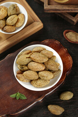 Traditional Chaoshan Candied Fruit Preserves and Nuts in Wooden Bowls - Healthy Snack Food Production
