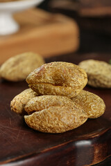 Fresh Peanuts in Shells on Wooden Board - Natural Healthy Snack Food Ingredients