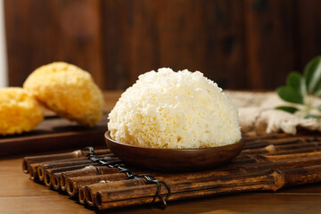 White Silver Ear Mushrooms Tremella Fuciformis in Wooden Bowl Traditional Asian Medicinal Fungus Ingredient