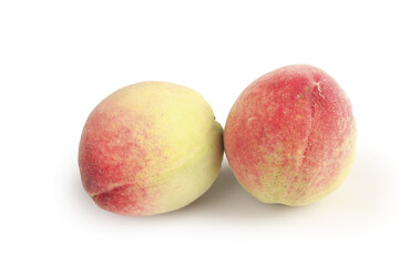 Fresh Ripe Peaches with Fuzzy Skin Isolated on White Background