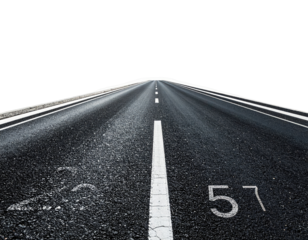 Straight asphalt road vanishing into the distance