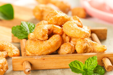 Crispy Baked Cashew Nuts with Salt in Wooden Bowl - Healthy Snack Food